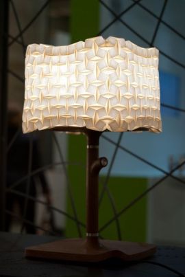 Origami inspired table lamp shade with mahogany base
