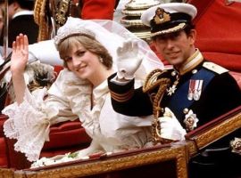 Princess Diana and Prince Charles in gilded carriage at wedding