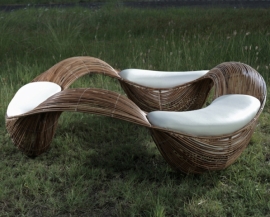 Three seats linked together by a wave-like design