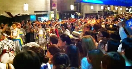 Umbrella dance performers at night of festival
